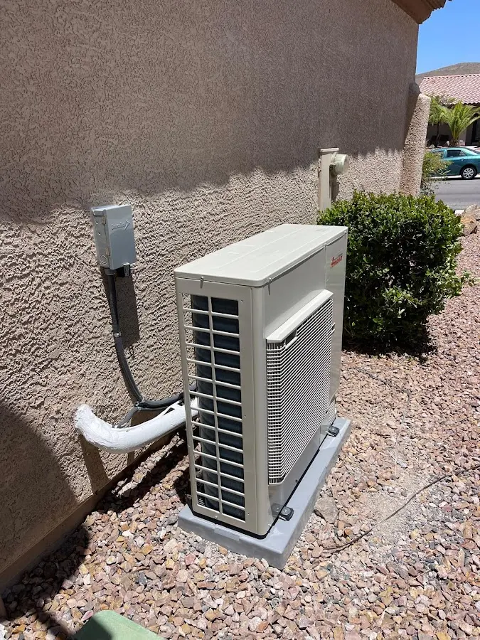 Residential air conditioning condenser unit in East Bakersfield
